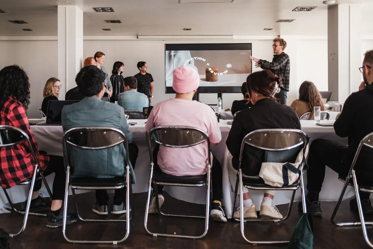 Professionals sharing ideas during a business presentation